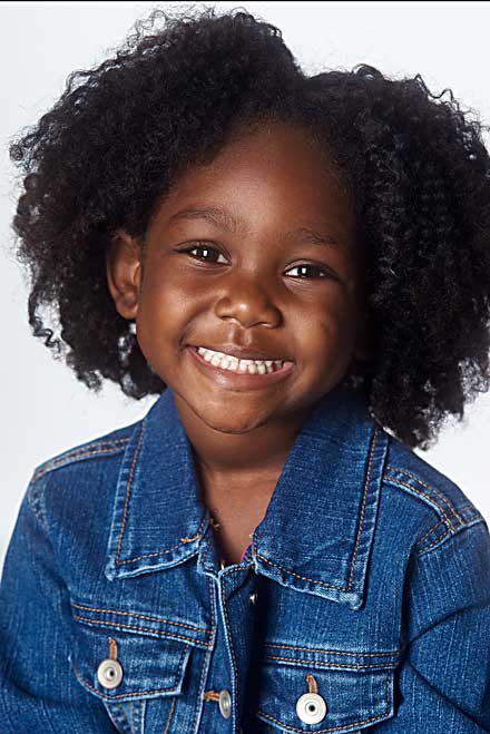 Child actor with a big smile